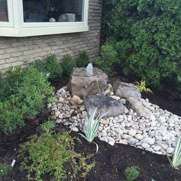 Front yard with no lawn and a lot of curb appeal