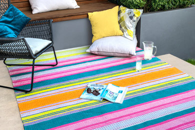 Medium sized classic back formal partial sun garden for summer in Other with decking.