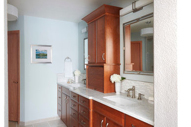 Example of a mid-sized transitional master gray tile and matchstick tile porcelain tile alcove shower design in Denver with flat-panel cabinets, dark wood cabinets, blue walls, an undermount sink and quartzite countertops