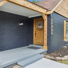 Texas Exteriors Stone and Cedar Wood Shutters
