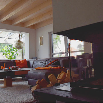 Offener Wohnraum mit Wintergarten