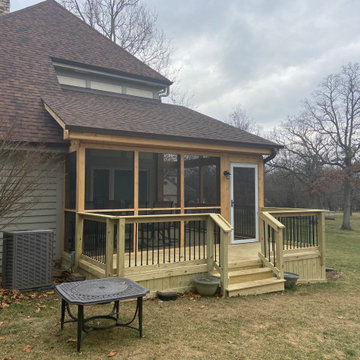 Screen Porch with Cathedral Ceiling, cedar rails, & shed roof in Lake Barrington