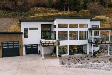 Trendy two-story exterior home photo in Other