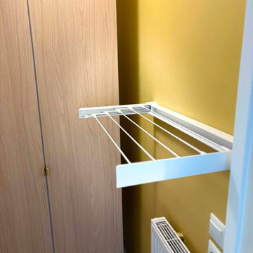 transformation d'une salle de douche en buanderie fonctionnelle