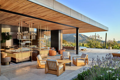 Inspiration for a contemporary patio remodel in Phoenix with no cover