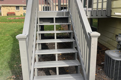 Example of a transitional exterior home design in Milwaukee