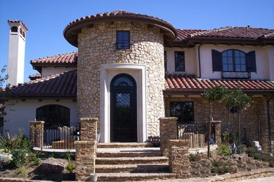 Mediterranean exterior home idea in Los Angeles