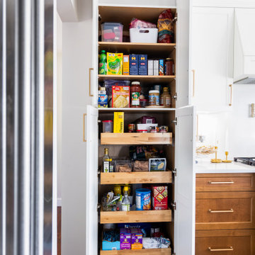 Open Pantry Tower Next to the Refrigerator