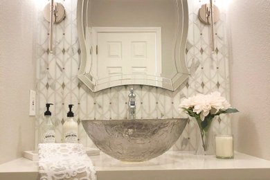Example of a small transitional 3/4 gray tile and marble tile medium tone wood floor and single-sink bathroom design in Portland with furniture-like cabinets, a vessel sink, quartz countertops, white countertops and a built-in vanity