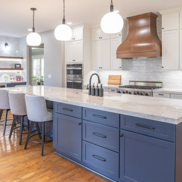 Porcelain Island Kitchen Remodel with Custom Built-Ins + Fireplace Feature