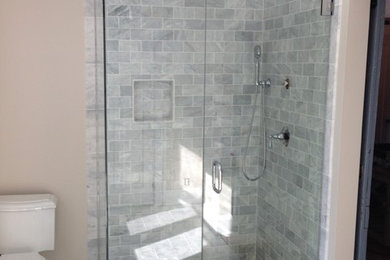 Inspiration for a transitional master white tile and stone tile marble floor corner shower remodel in Cincinnati with a two-piece toilet and beige walls