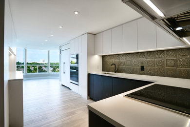 Example of a minimalist kitchen design in Toronto