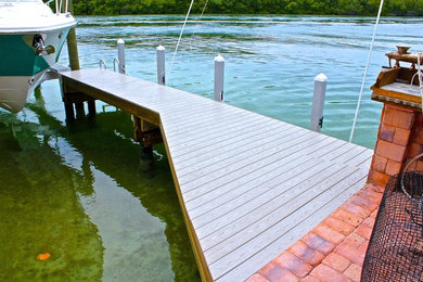 Inspiration for a tropical home design remodel in Miami