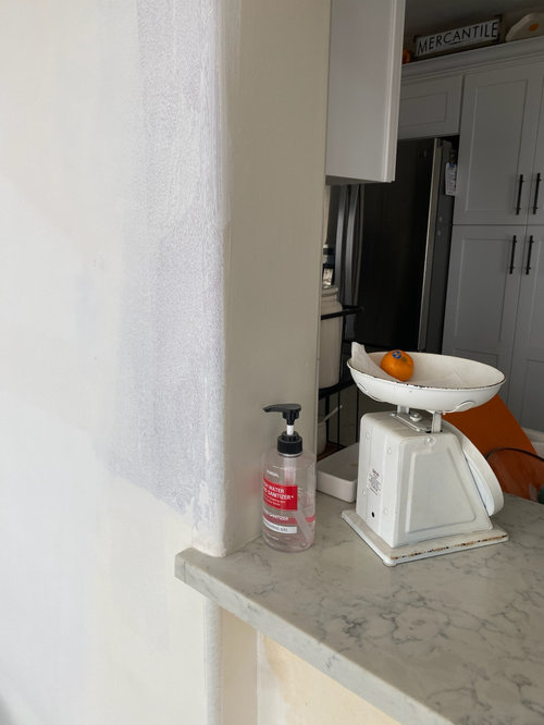 How to split paint colors between two rooms that share an open doorway