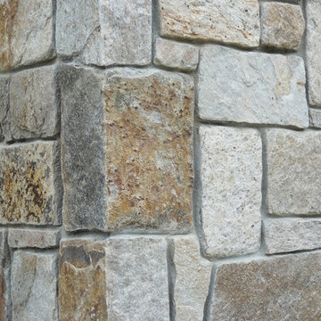 Combining Colonial Tan Natural Stone with Olive Green Siding