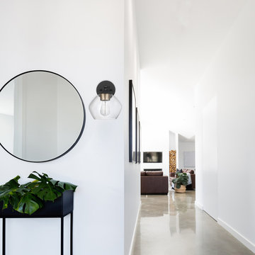 Harrow 1-Light Wall Sconce, Matte Black, Gold Accent Socket, Clear Glass Shade