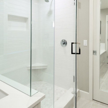 Contemporary and Bright Twin Bathrooms