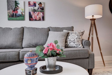 Minimalist open concept living room photo in Denver
