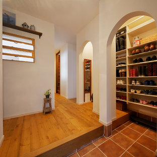 他の地域のカントリー風おしゃれな玄関の写真