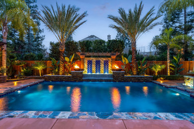 Example of a tuscan exterior home design in Other