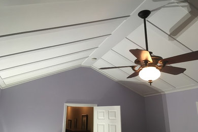Arts and crafts master dark wood floor bedroom photo in Boston