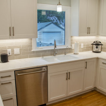 The Right Lights and White Quartz for a Bright Kitchen