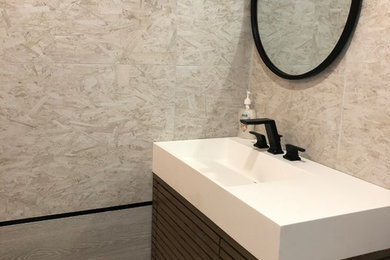 Transitional powder room photo in Other