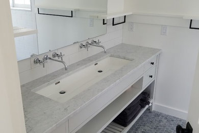 Example of a transitional bathroom design in Burlington