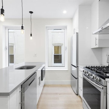 White High Gloss Kitchen & Bath Remodeling
