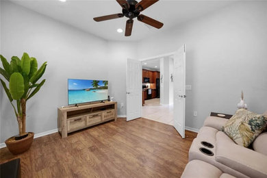 Family room - large family room idea in Tampa
