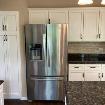 Traditional Kitchen Remodel Done in an Antique White with a Walnut Glaze