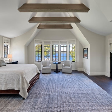 Bedroom with Curved Ceiling Detail and Exposed Beams