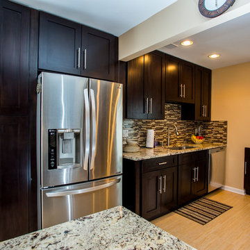 Contemporary Espresso Kitchen Remodel with Granite Counters & Mosaic Backsplash