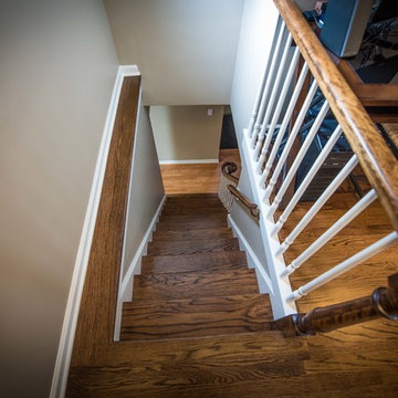 Whie Wooden Stairs with Brown Railings (top view)