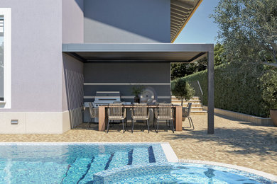 Idee per una piscina a sfioro infinito design personalizzata di medie dimensioni e dietro casa con pavimentazioni in pietra naturale