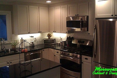 Elegant kitchen photo in Cleveland