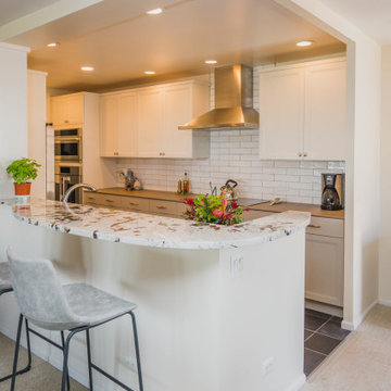 Open Kitchen with Porcelain Slab Breakfast Bar