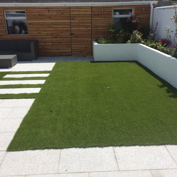 Artificial lawn with stepping stones