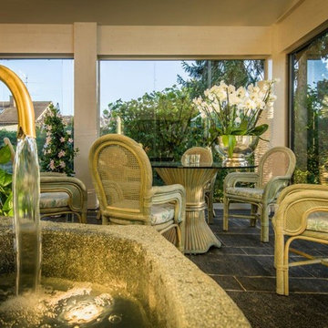 Eleganter Kaltwintergarten unter bestehendes Vordach