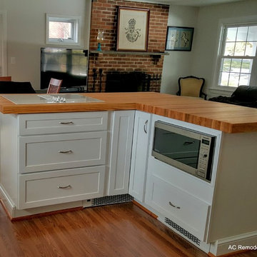 Sue's white kitchen and butcher block countertops.