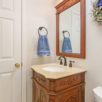 Antique-Inspired Carved Vanity in Mira Mesa Bathroom Remodel