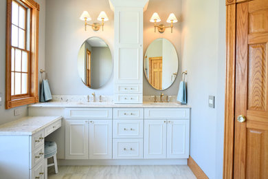 Large master double-sink bathroom photo in Grand Rapids with a built-in vanity