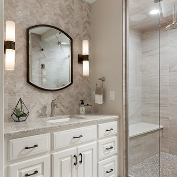 Light and airy lower level bathroom with steam shower | Che Bella Interiors