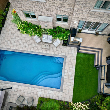 Aurora Fiberglass Pool with Custom Composite Deck, Pergola & Privacy Landscaping