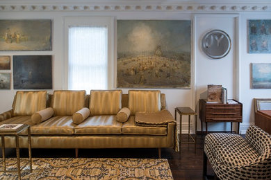 Living room - 1960s dark wood floor living room idea in New York with white walls