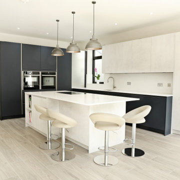 Pronorm Handless in Midnight Blue & Oxide concrete with Cimstone Cortina worktop