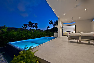 Patio - contemporary patio idea in Other
