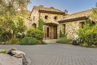 Example of an exterior home design in Other