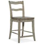 Hooker Furniture - Alfresco La Riva Ladder Back Swivel Counter Stool - The La Riva Memory Swivel Counter Stool has a classic ladderback design with a French twist, distinguished by a soft silhouette and stylish flair. Crafted of Oak Veneers, the La Riva Counter Stool has a 24 _-inch seat height and is finished in an organic Oyster color in a versatile neutral light gray tone with distressing and scaping for the look of an authentic antique.