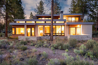 Mid-sized contemporary beige two-story wood flat roof idea in Other